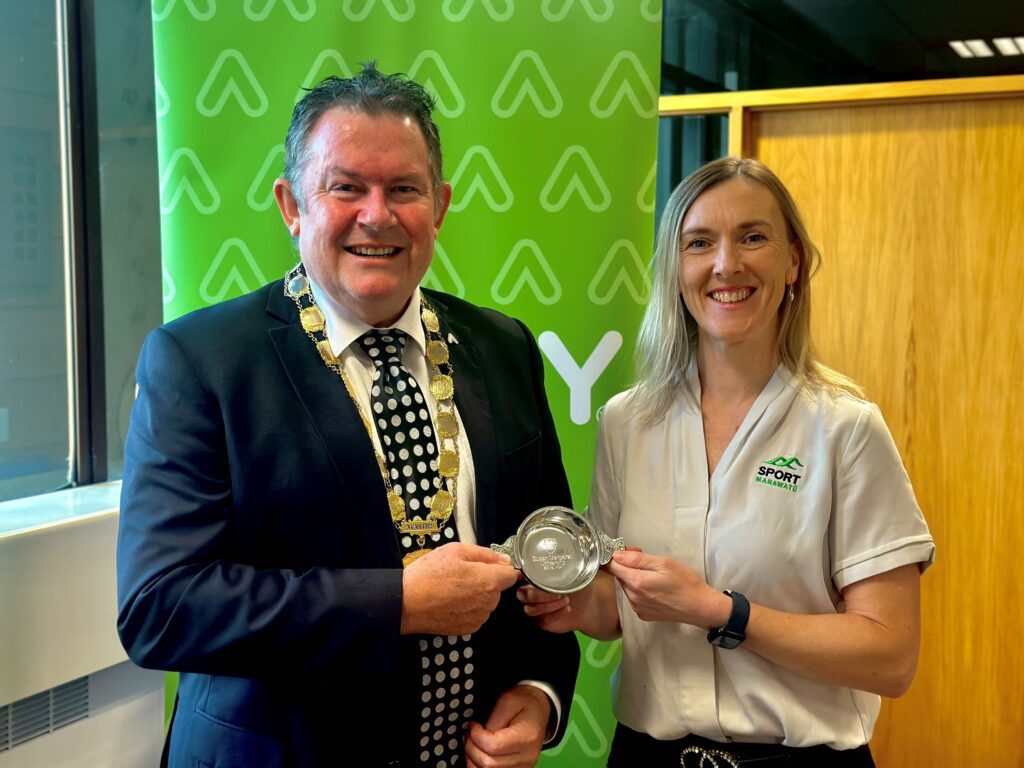 Palmerston North Mayor Grant Smith (left) receiving the Quaich (a traditional Scottish drinking vessel) from Queen Margaret University, handed over by Sport Manawatū CEO Kelly Shanks.